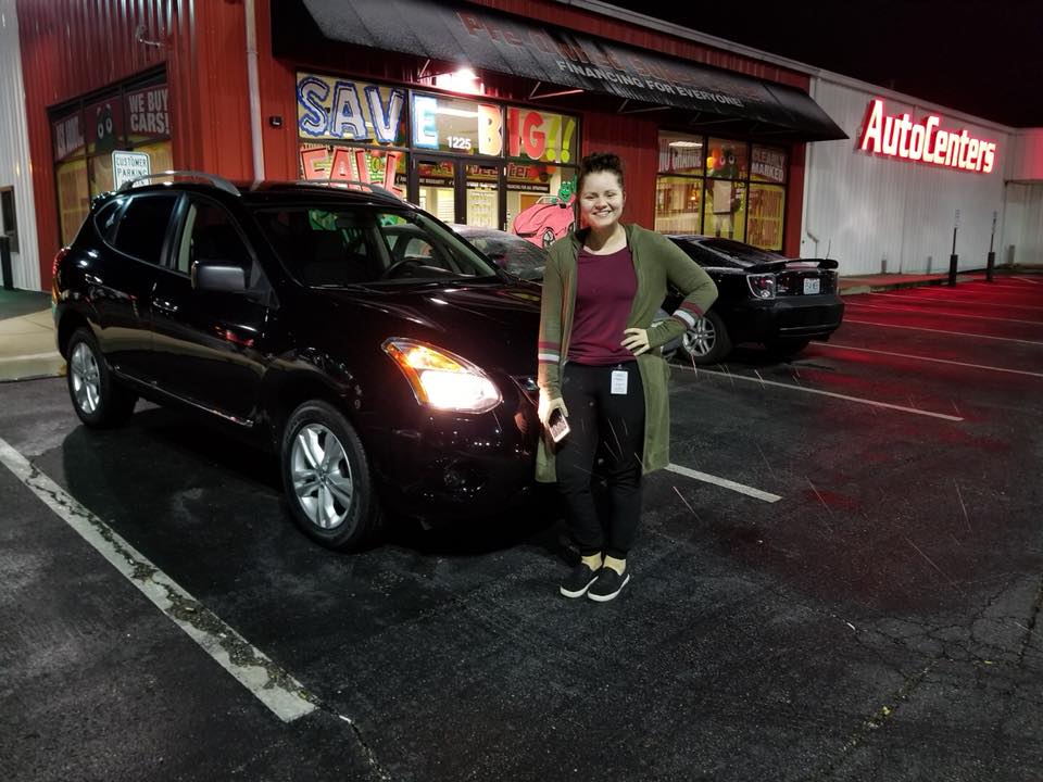 Happy Green Light Auto Credit customer with car