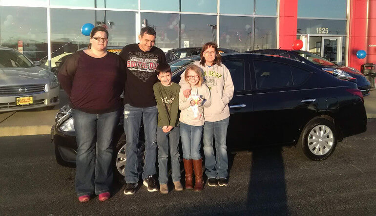 family with new car